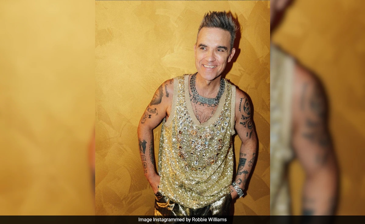 Robbie Williams Is Suffering From “Manopause”: “I’m F****** Knackered”
