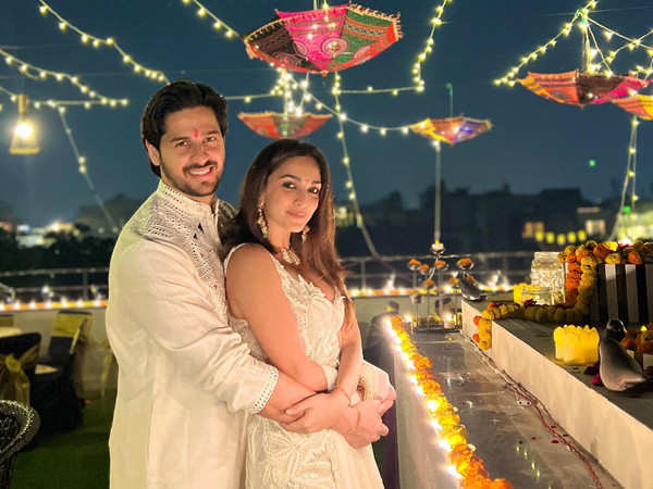Sidharth Malhotra twins in white with his love Kiara Advani as they celebrate their first Diwali