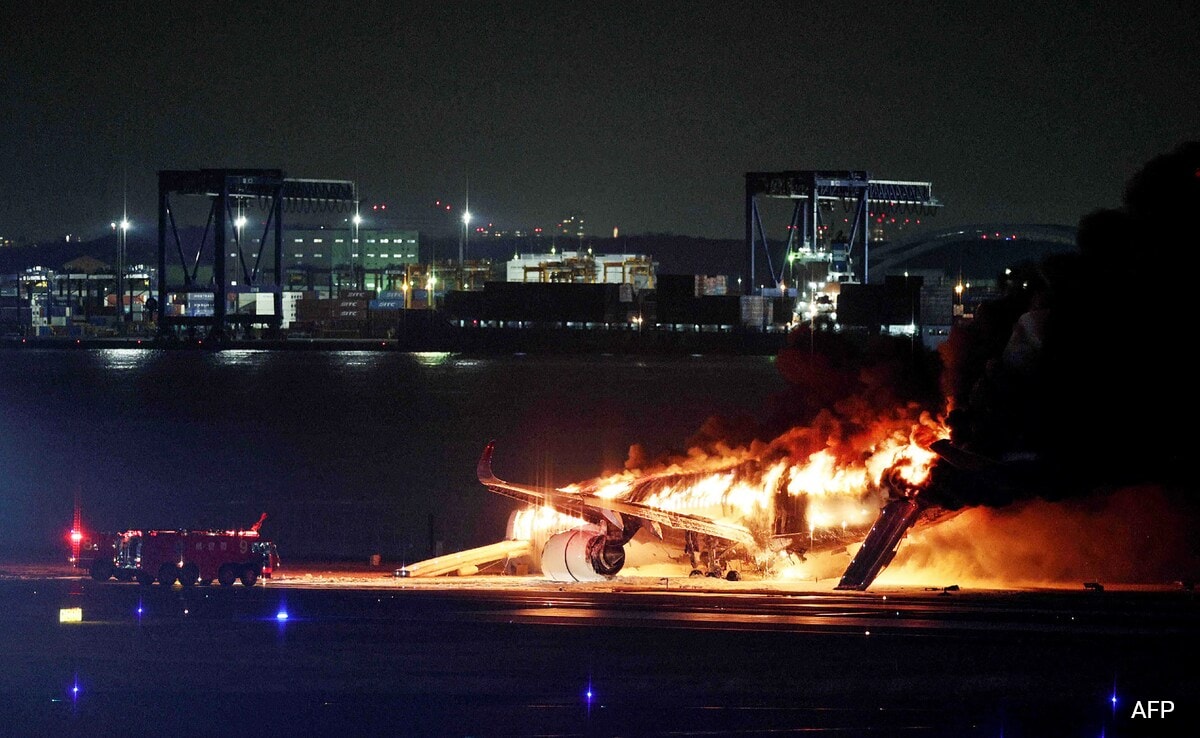 “Miracle” Evacuation From Burning Japan Jet Helped By Fliers Leaving Bags