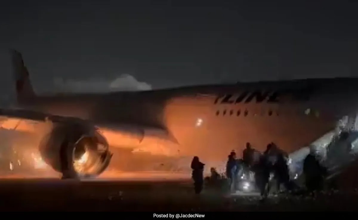 Video: Passengers Slide Down From Burning Plane In Japan