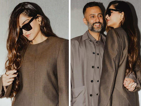 Sonam Kapoor slays in an asymmetrical formal attire as she poses with Anand Ahuja