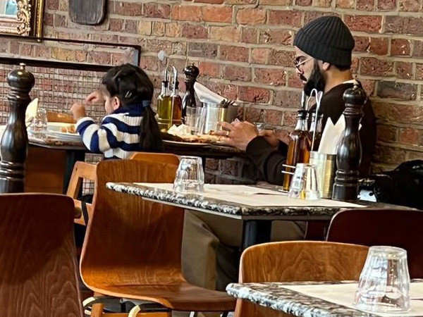 Virat Kohli and his daughter Vamika were seen at a restaurant in London. Pic goes viral