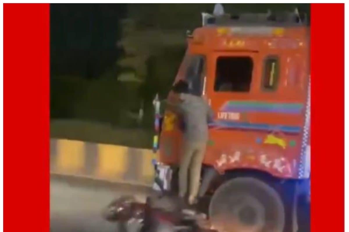 Hyderabad Man Hangs On Side Of Speeding Truck As Vehicle Drags His Two-Wheeler Underneath | WATCH