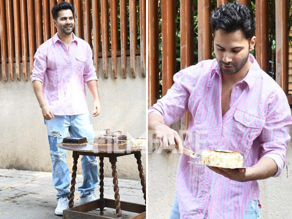Varun Dhawan cuts his birthday cake with the paparazzi. See pics: