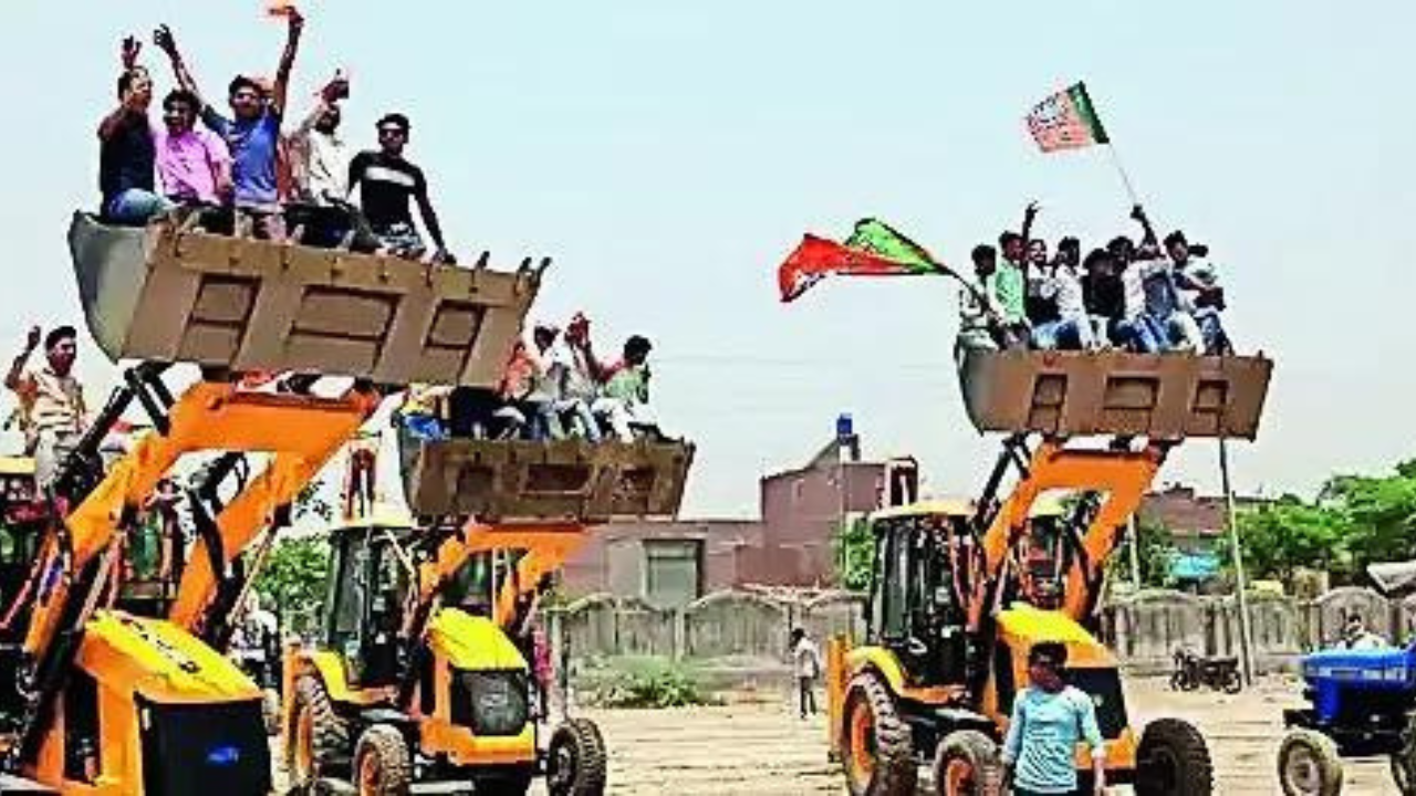 Now, bulldozer ‘break dance’ at CM Yogi Adityanath poll rally Now, bulldozer ‘break dance’ at CM Yogi Adityanath poll rally