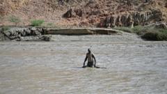 Dam bursts in war-torn Sudan killing 60
