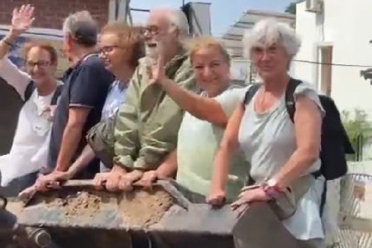 Video Of Foreign Tourists Being Driven Around Flooded Vadodara On Bulldozer’s Scoop Goes Viral