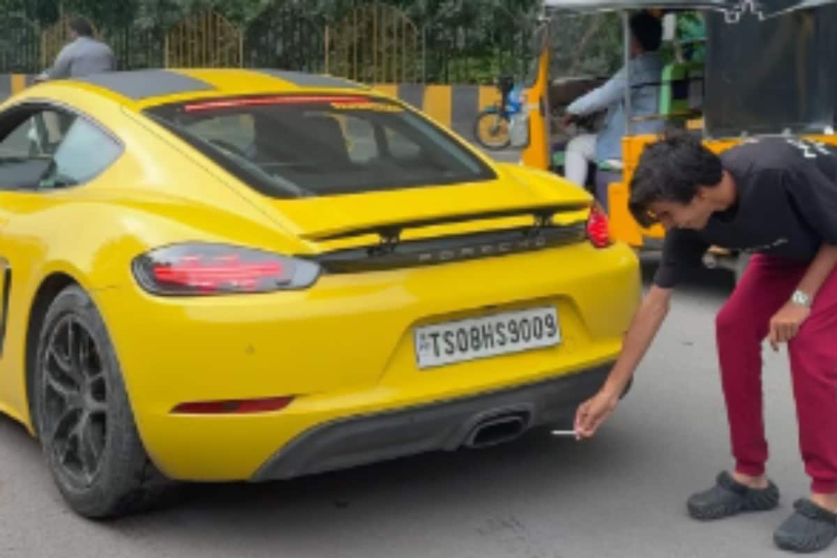 Man Tries To Light Cigarette With Porsche’s Exhaust, Burns Hand | Video Man Tries To Light Cigarette With Porsche’s Exhaust, Burns Hand | Video