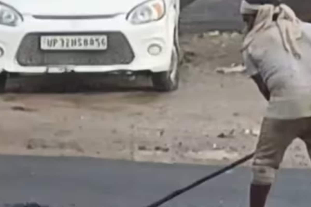 PWD Workers Lay Down Road During Heavy Rain in UP’s Sitapur, Viral Video Sparks Anger