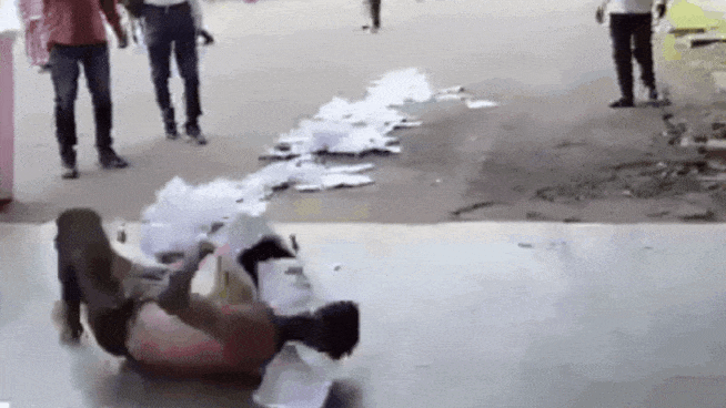 Watch: Man wears garland of complaints, rolls on ground in desperation over corruption