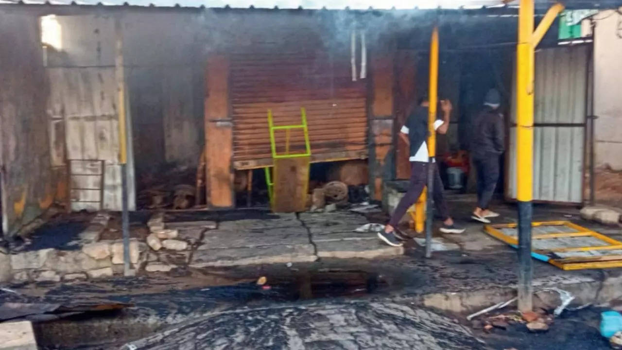 Karnataka’s night of chaos: Mob plunders 25 shops, sets stolen vehicles on fire