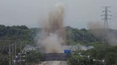 Moment North Korea blows up roads connecting to South Korea