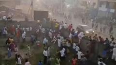 135 killed in football stadium crush, Guinea rights groups say