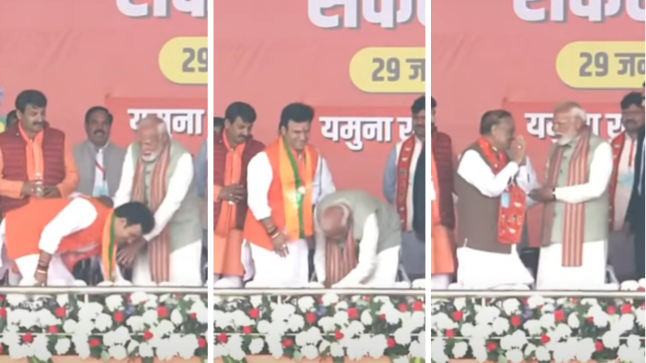 Watch: PM Modi touches feet of Delhi BJP candidate 3 times