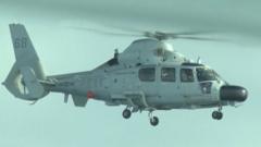 Chinese navy helicopter flies ‘dangerously’ close to Philippine plane