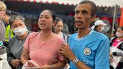 At least 15 still alive under Bangkok skyscraper rubble, rescuers say