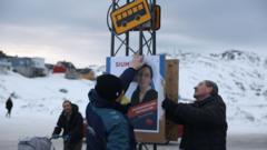 ‘There’s never been a spotlight like this’: Greenland heads to the polls as Trump eyes territory
