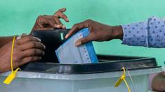 Coup leader seeks win in first vote since Gabon army takeover