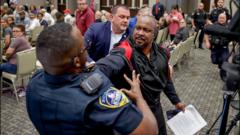 Protester tasered and arrested at Republican town hall