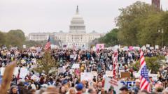 Anti-Trump protests in cities across US declare ‘hands off’