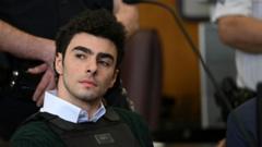 Mangione pleads not guilty to federal murder charge over CEO’s killing