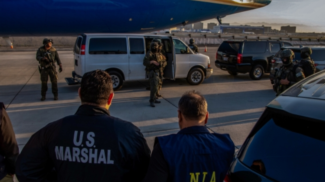 Legs, waist shackled: US releases 1st pic of Rana’s handover to NIA