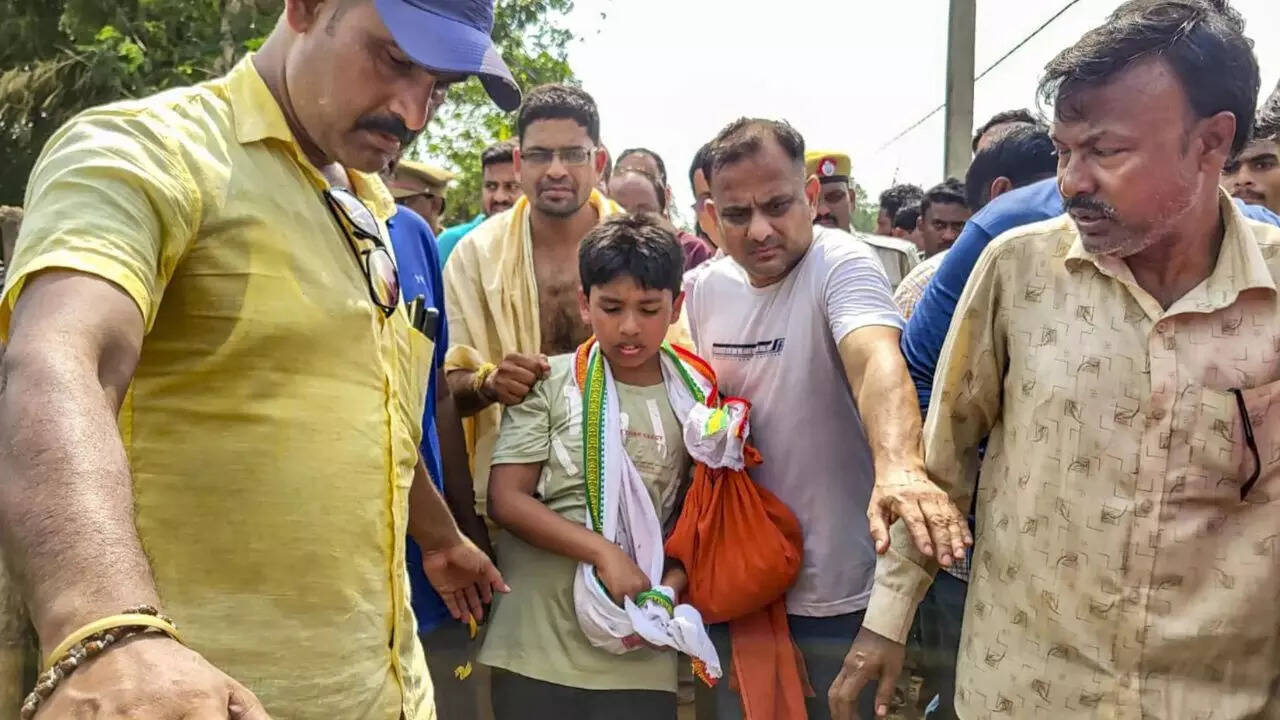 Pahalgam attack: Visibly shaken 9-yr-old lights father’s pyre after mom faints