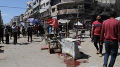 Israeli strikes on Gaza restaurant and market kill 33, health ministry says