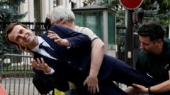 Macron waxwork stolen from French museum by activists