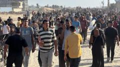 At least 15 killed in Israeli fire near Gaza aid centre, say medics