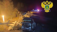 At least seven dead after Russian bridge collapses onto train