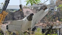 Investigators find cockpit voice recorder from crashed Air India flight