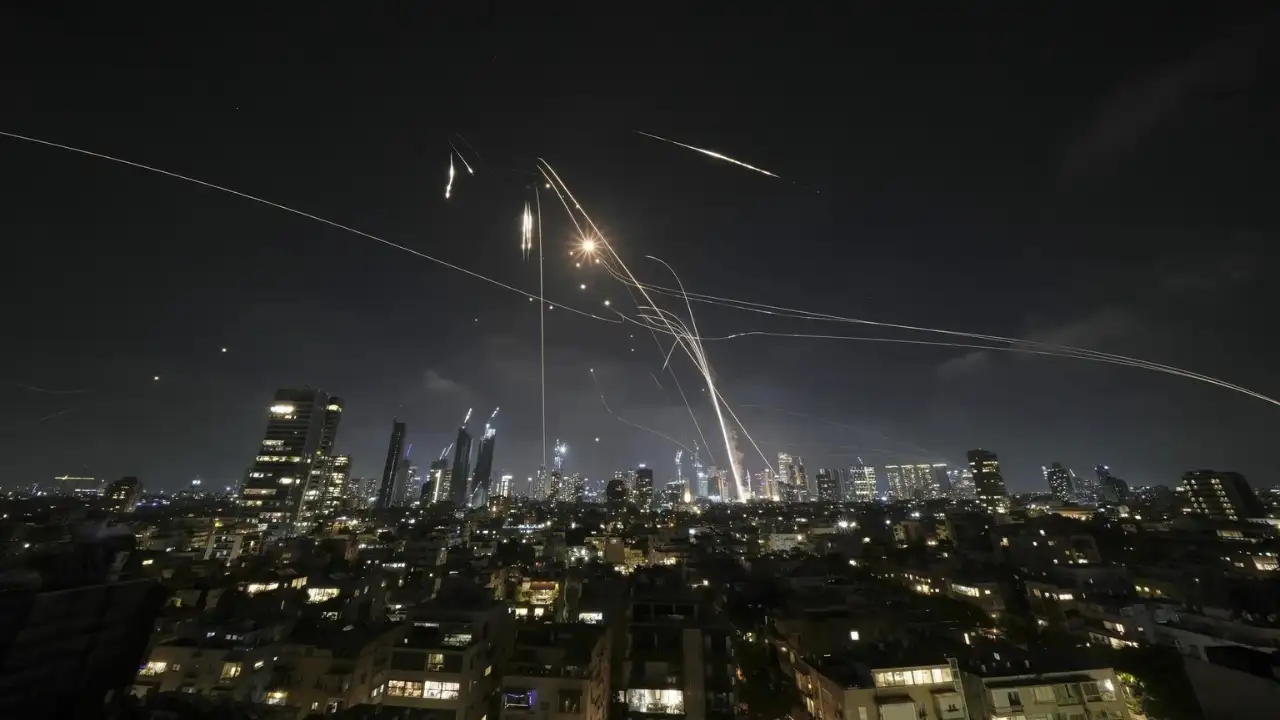 ‘Bring it to ruin’: Iran launches ‘dozens’ of ballistic missiles at Israel
