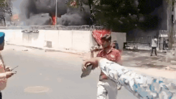 Watch: New video shows AI crash survivor emerging from burning wreckage
