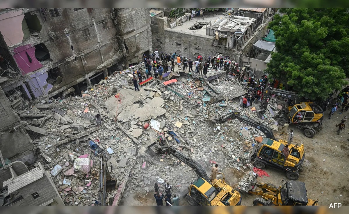 Search On For Survivors Of Pakistan Building Collapse