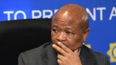 South Africa’s police minister suspended over organised crime allegations