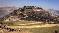 Israeli settlers kill Palestinians in West Bank attack, health ministry says