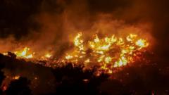 Mass evacuations as wildfire rages in Greek island of Crete