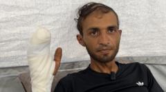 We might get killed, yet we still go to get flour, injured Gaza man tells BBC