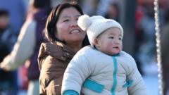 China offers parents ,500 in bid to boost births