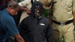 Man who alleged rapes and secret burials in Indian temple town arrested