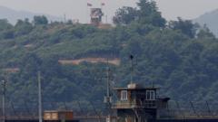 South Korea fires warning shots at North Korean troops crossing border