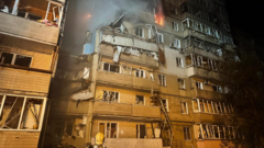Baby among two killed in Russian drone attack on Kyiv, officials say
