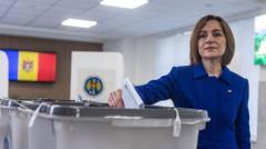Pro-EU party in Moldova takes lead in election mired in claims of interference
