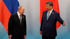 Russia’s Putin hails ‘unprecedented’ ties with China as talks begin