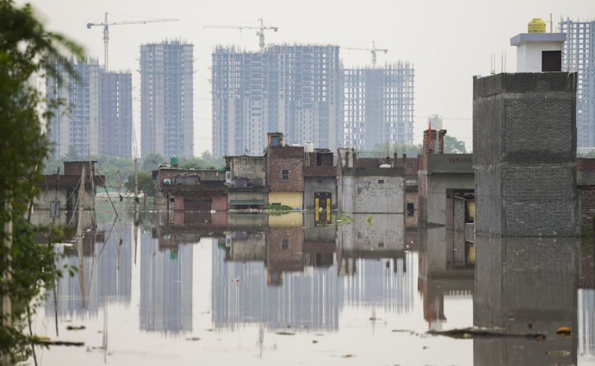 Pics: Delhi Streets Turn Into Streams, Markets Under Water Amid Yamuna Flooding
