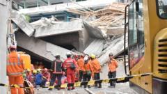 ‘No signs of life’ for dozens missing in Indonesia school collapse