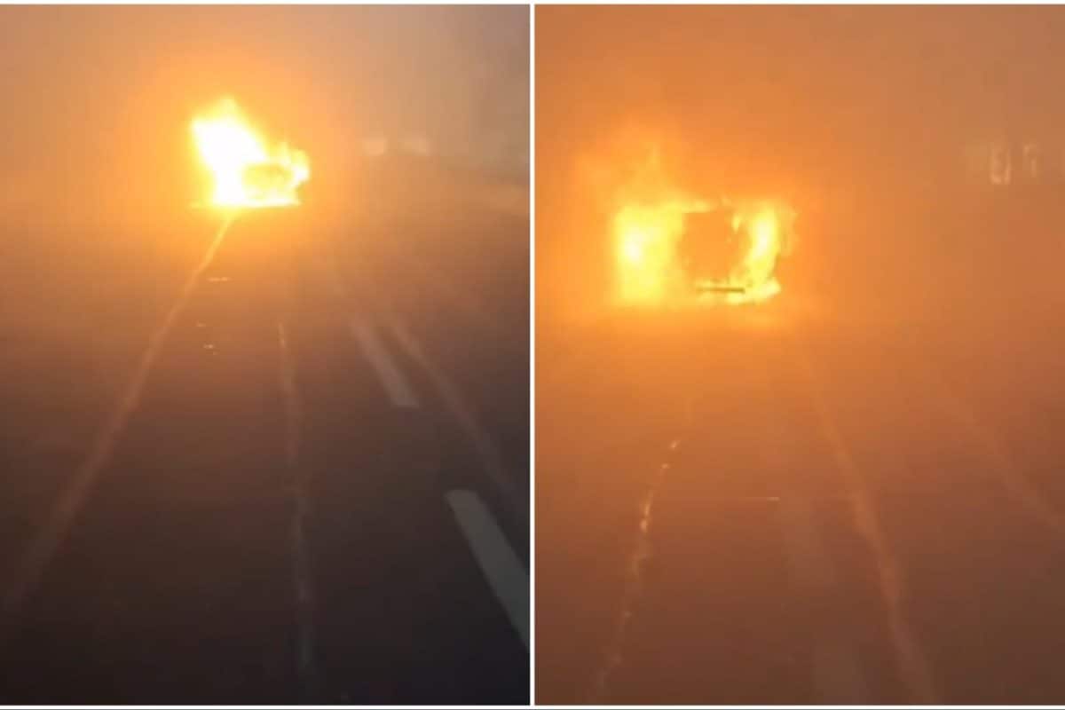 Car Catches Fire On Noida-Greater Noida Expressway, Driver Escapes Unhurt | Video Car Catches Fire On Noida-Greater Noida Expressway, Driver Escapes Unhurt | Video